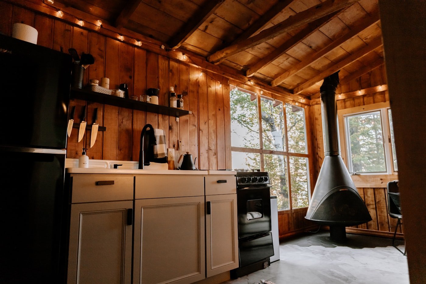 A wood stove burning inside a Norwegian mountain cabin.