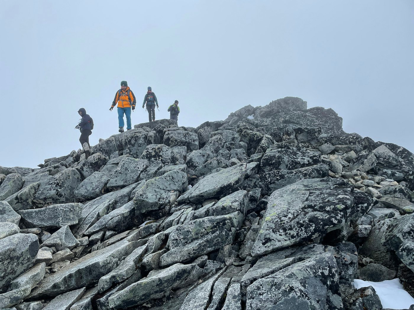 A walker on the rocky Hardangervidda plateau leading to Trolltunga.